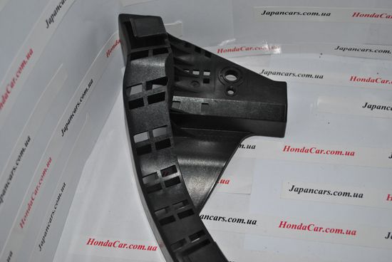 Кронштейн крепления переднего бампера левый Honda 71190-TL0-G01