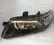 Фара передняя левая TYC 20-C002-05-2B